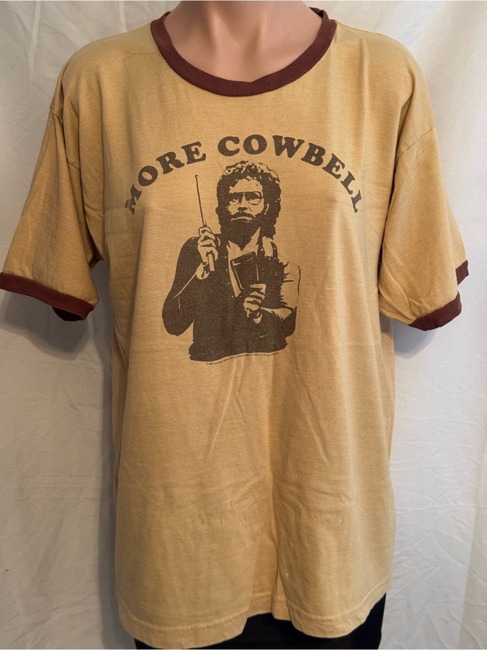 More Cowbell Saturday Night Live Graphic Ringer T-Shirt - Tan with Brown Trim
